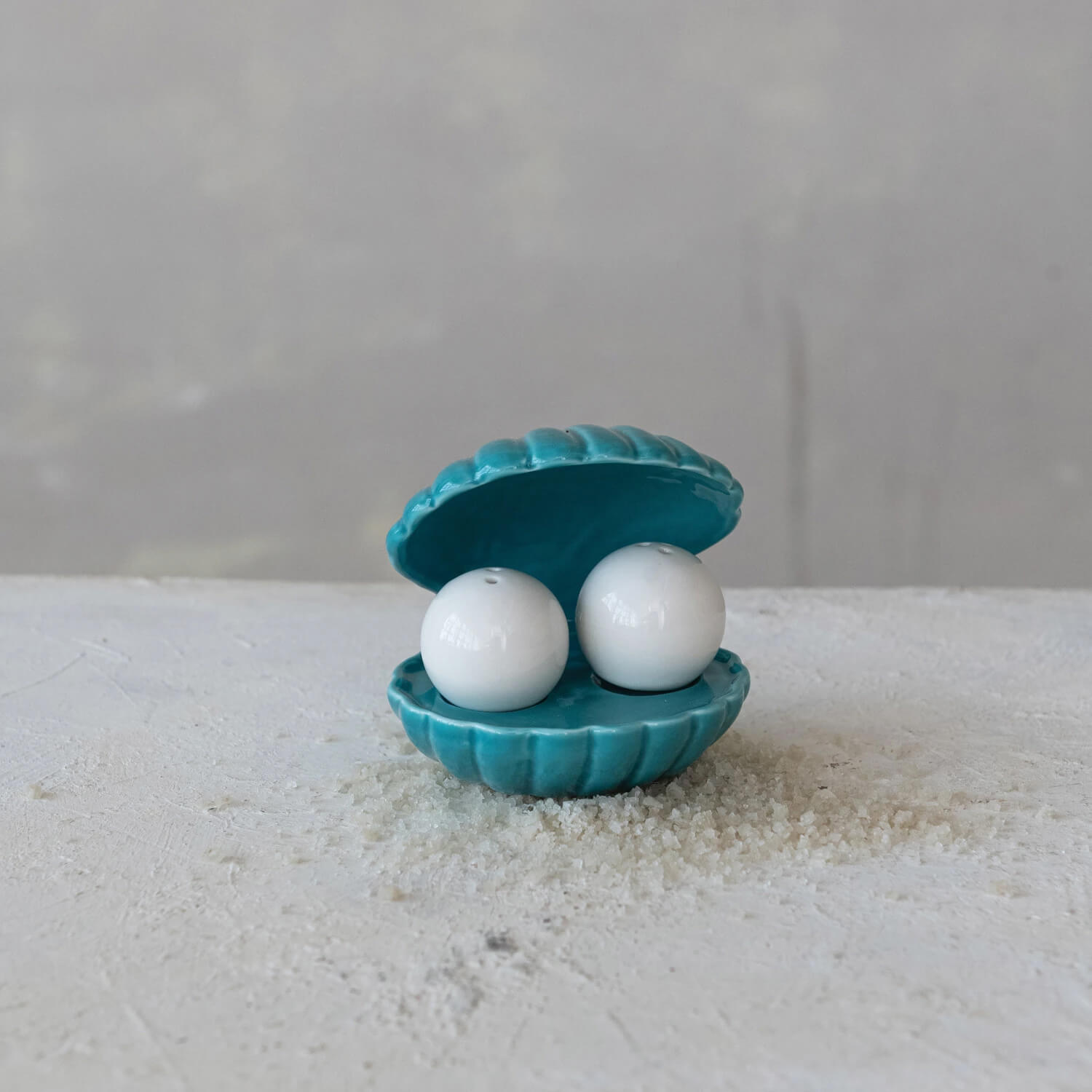 Clam and Pearl Stoneware Salt & Pepper Shakers Set front | MILK MONEY milkmoney.co | Home decor online, Modern home decor, Luxury home furnishings, Best home decor, Home accessories for sale, Living room furniture sets, Kitchen decor ideas, Wall art for home, Bathroom accessories, Vintage home decor, Minimalist home decor