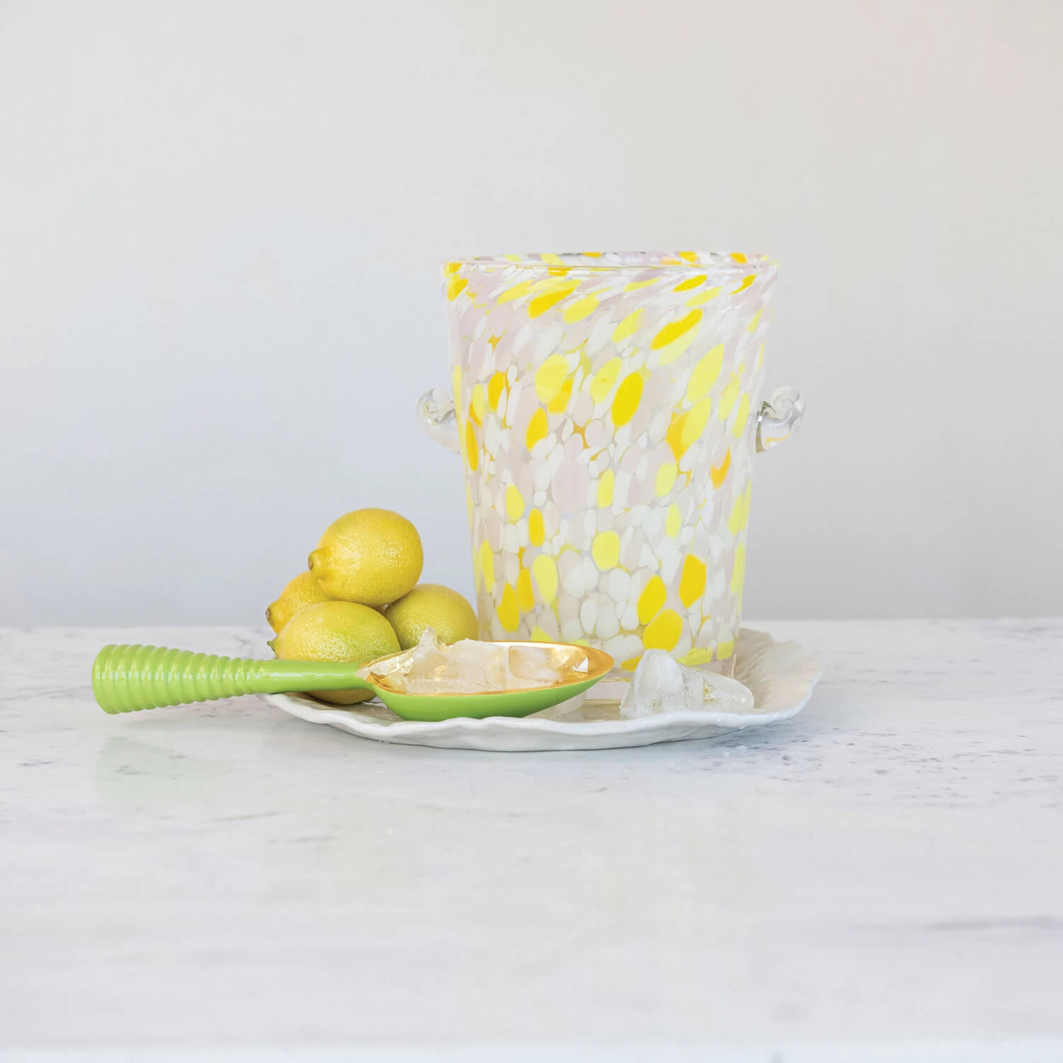Confetti Glass Ice Bucket with Handles yellow front | MILK MONEY milkmoney.co | Home decor online, Modern home decor, Luxury home furnishings, Best home decor, Home accessories for sale, Living room furniture sets, Kitchen decor ideas, Wall art for home, Bathroom accessories, Vintage home decor, Minimalist home decor