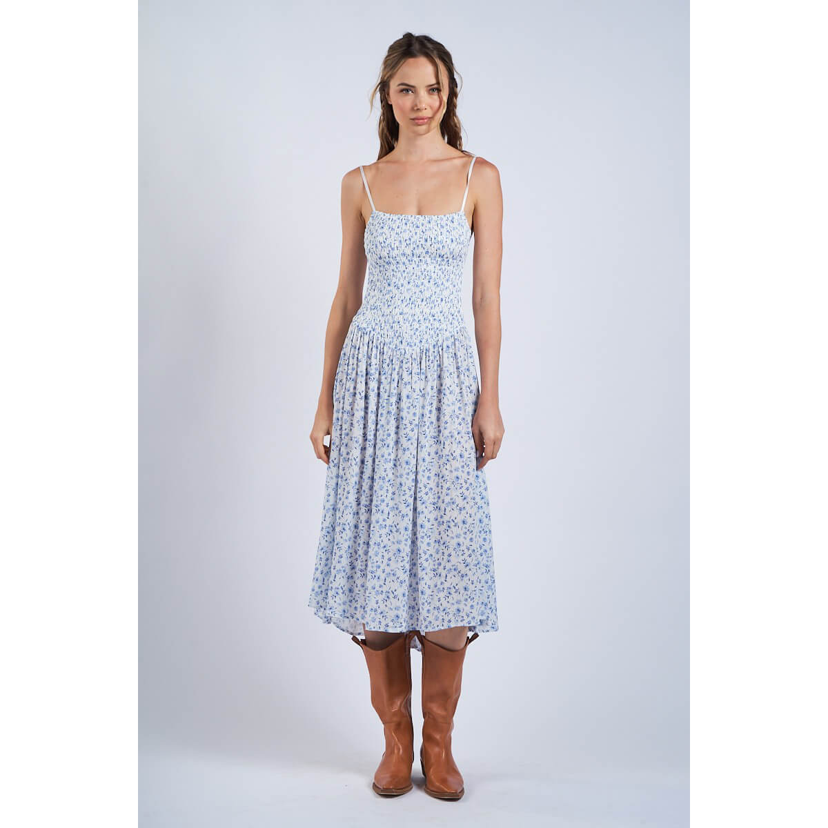 Ditsy Floral Smocked Midi Dress blue front | MILK MONEY milkmoney.co | cute clothes for women. womens online clothing. trendy online clothing stores. womens casual clothing online. trendy clothes online. trendy women's clothing online. ladies online clothing stores. trendy women's clothing stores. cute female clothes.