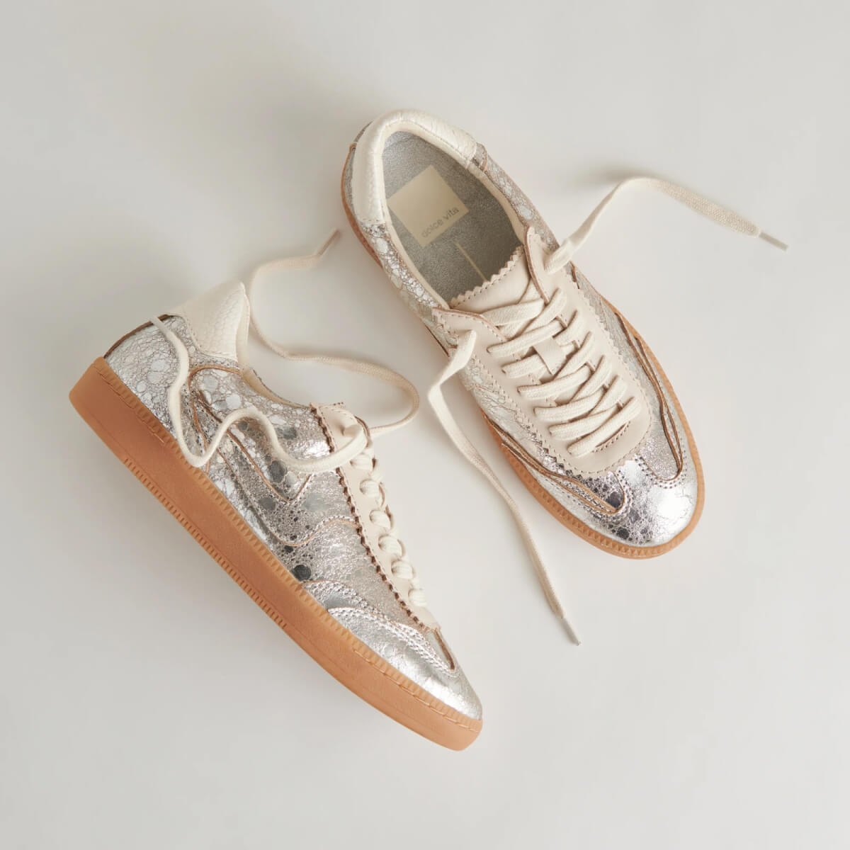Dolce Vita Notice Sneakers silver side | MILK MONEY milkmoney.co | cute shoes for women. ladies shoes. nice shoes for women. footwear for women. ladies shoes online. ladies footwear. womens shoes and boots. pretty shoes for women. beautiful shoes for women.