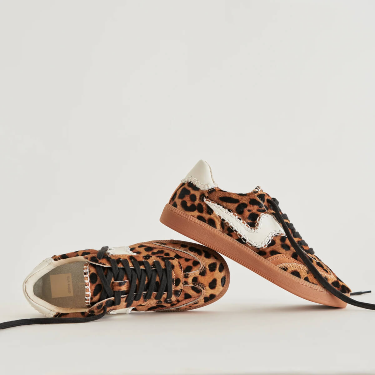 Dolce Vita Notice Stitch Sneakers leopard side | MILK MONEY milkmoney.co | cute shoes for women. ladies shoes. nice shoes for women. footwear for women. ladies shoes online. ladies footwear. womens shoes and boots. pretty shoes for women. beautiful shoes for women.
