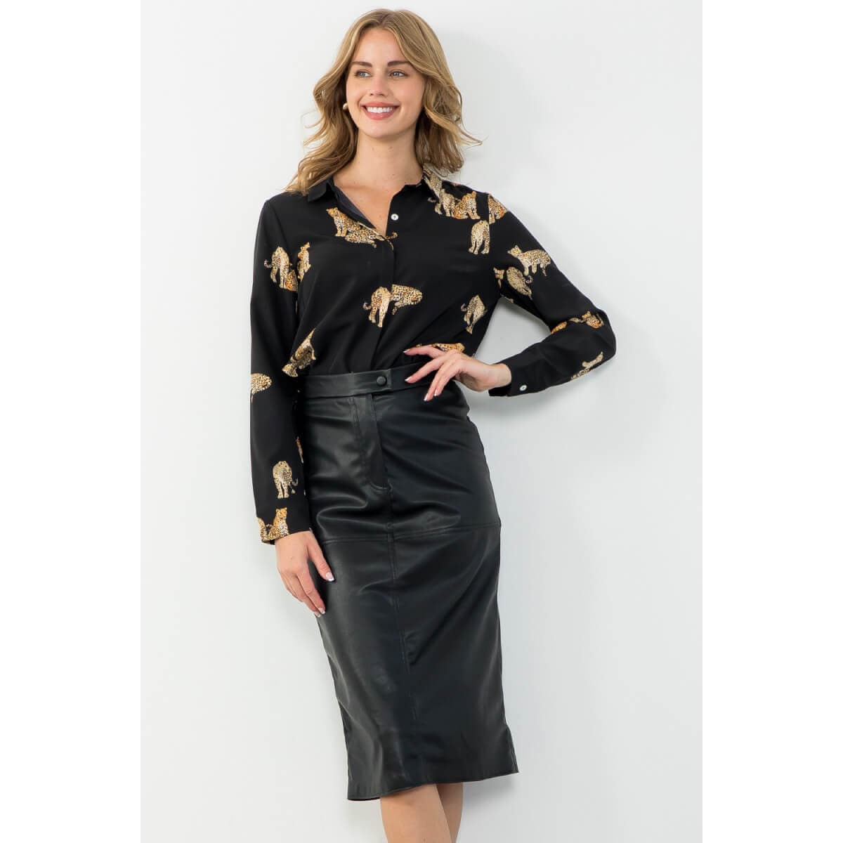 Faux Leather Midi Skirt black front | MILK MONEY milkmoney.co | cute clothes for women. womens online clothing. trendy online clothing stores. womens casual clothing online. trendy clothes online. trendy women's clothing online. ladies online clothing stores. trendy women's clothing stores. cute female clothes.
