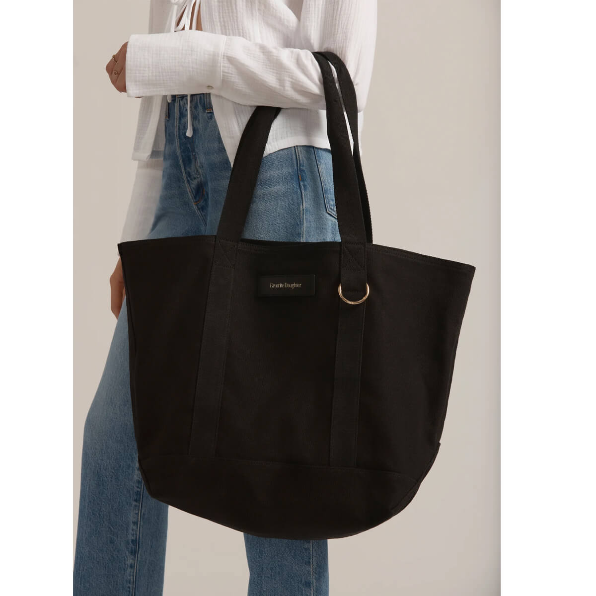 Favorite Daughter The Travel Tote black front | MILK MONEY milkmoney.co | women's accessories. cute accessories. trendy accessories. cute accessories for girls. ladies accessories. women's fashion accessories.