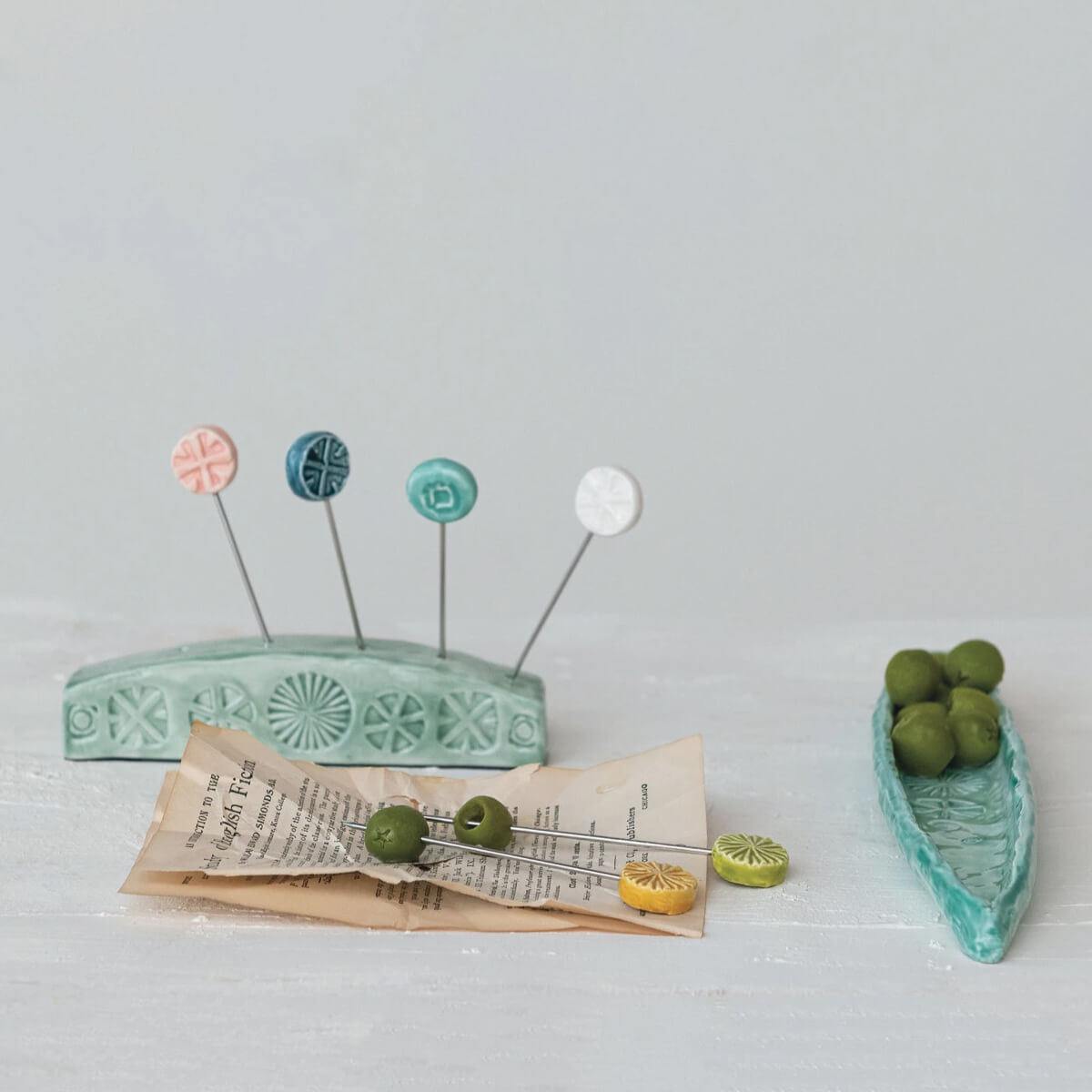 Hand-Painted Debossed Stoneware Appetizer Picks w/ Holder front | MILK MONEY milkmoney.co | Home decor online, Modern home decor, Luxury home furnishings, Best home decor, Home accessories for sale, Living room furniture sets, Kitchen decor ideas, Wall art for home, Bathroom accessories, Vintage home decor, Minimalist home decor