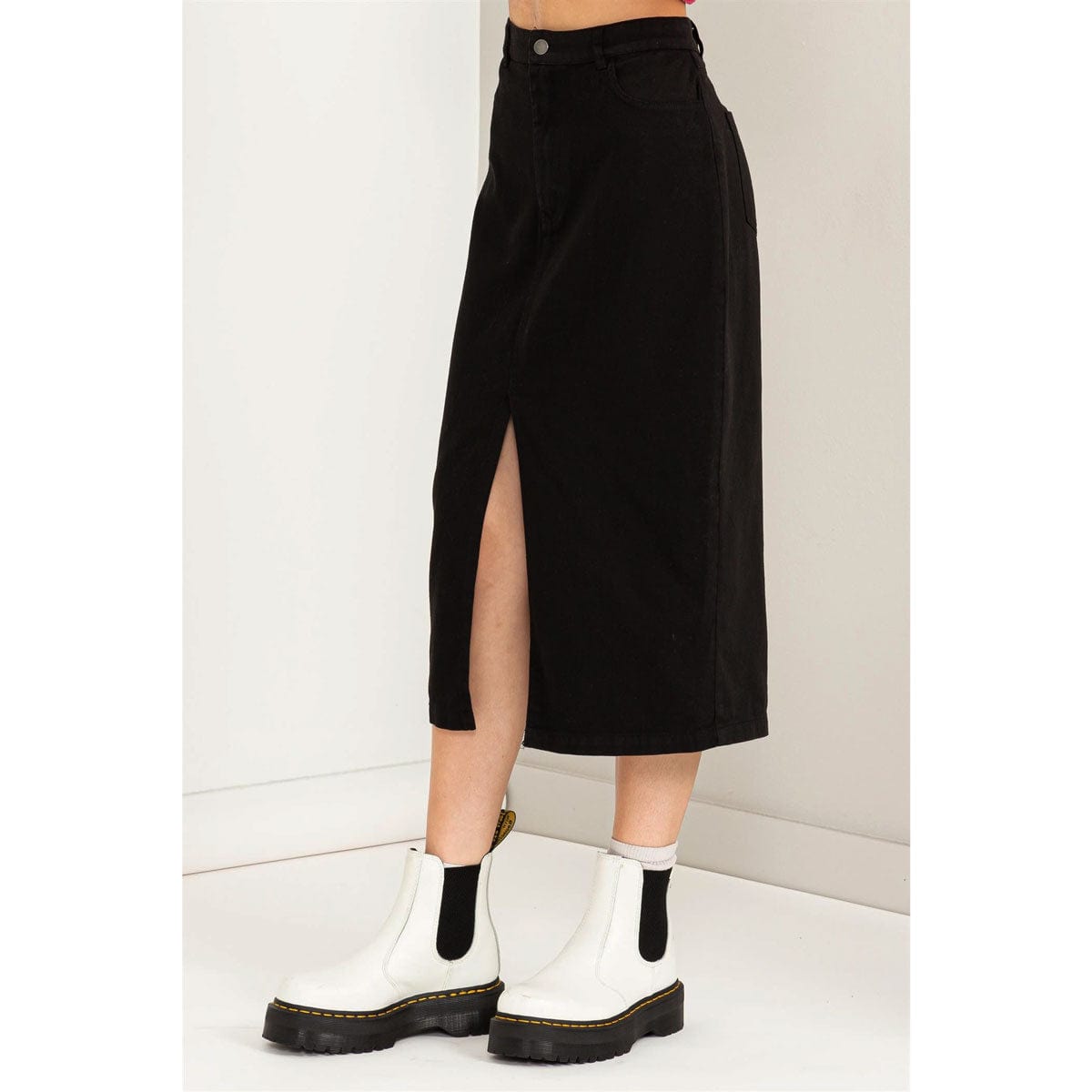 High Waisted Midi Skirt black side | MILK MONEY milkmoney.co | cute clothes for women. womens online clothing. trendy online clothing stores. womens casual clothing online. trendy clothes online. trendy women's clothing online. ladies online clothing stores. trendy women's clothing stores. cute female clothes.