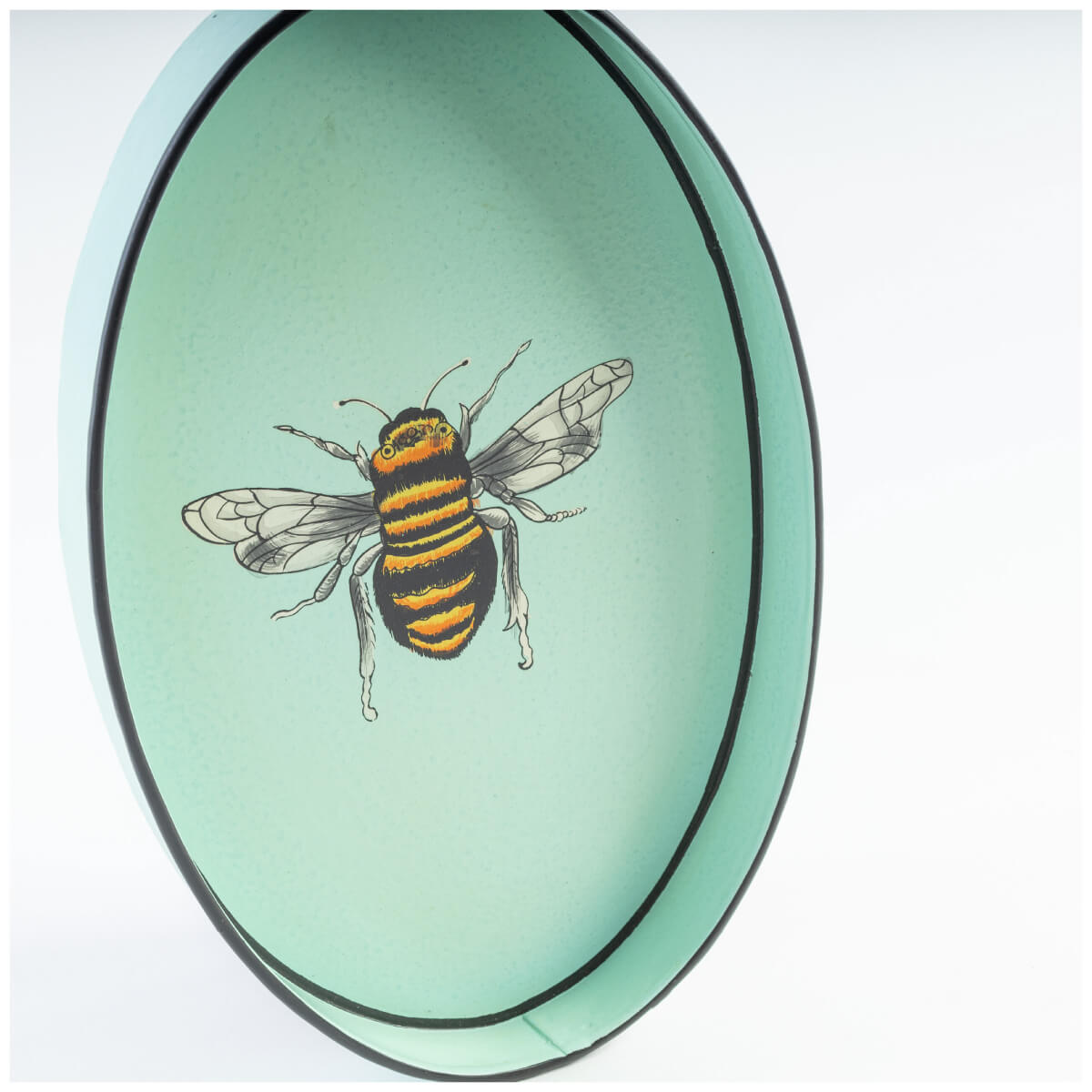 Les Ottomans Bee Hand Painted Oval Iron Tray blue front | MILK MONEY milkmoney.co | Home decor online, Modern home decor, Luxury home furnishings, Best home decor, Home accessories for sale, Living room furniture sets, Kitchen decor ideas, Wall art for home, Bathroom accessories, Vintage home decor, Minimalist home decor