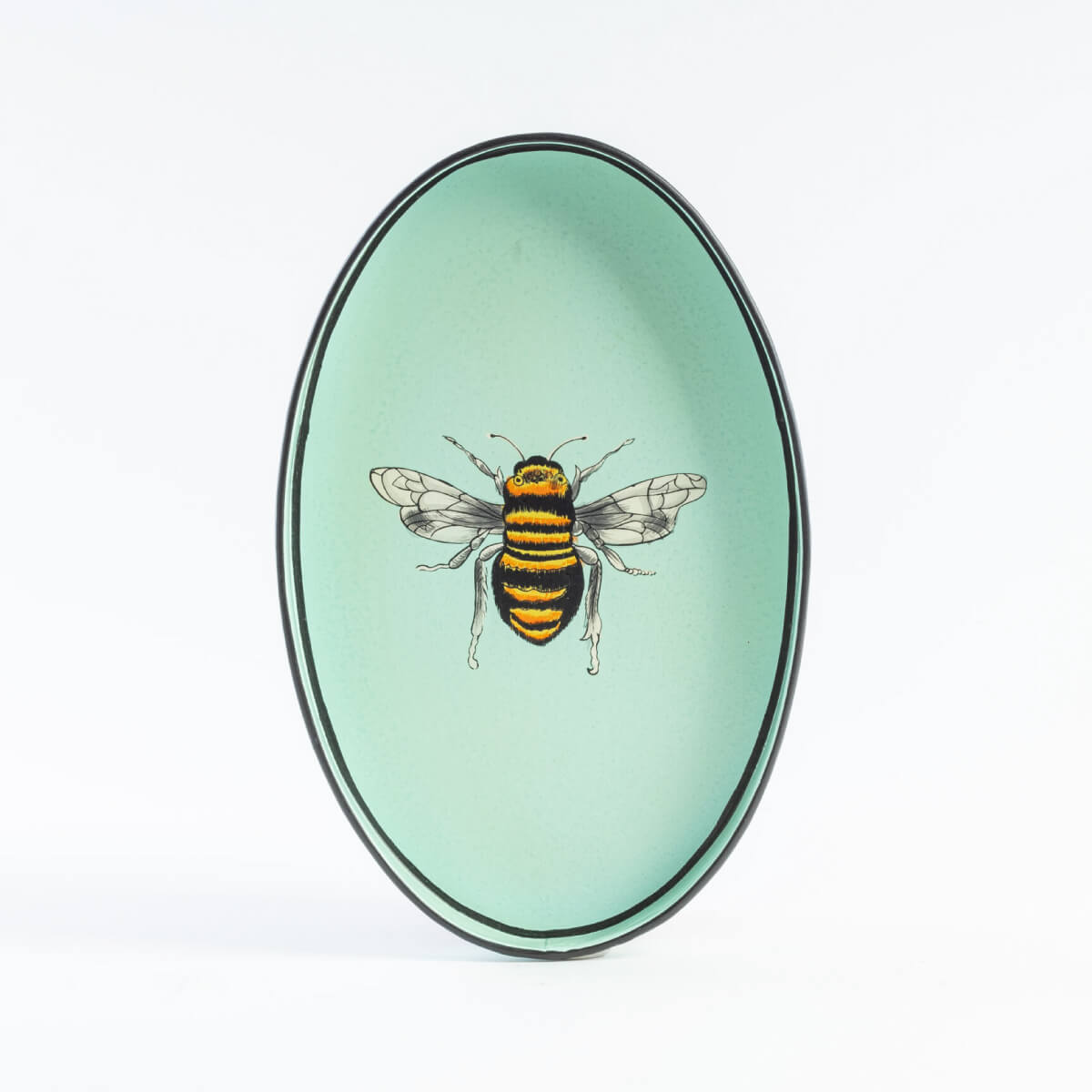 Les Ottomans Bee Hand Painted Oval Iron Tray blue front | MILK MONEY milkmoney.co | Home decor online, Modern home decor, Luxury home furnishings, Best home decor, Home accessories for sale, Living room furniture sets, Kitchen decor ideas, Wall art for home, Bathroom accessories, Vintage home decor, Minimalist home decor