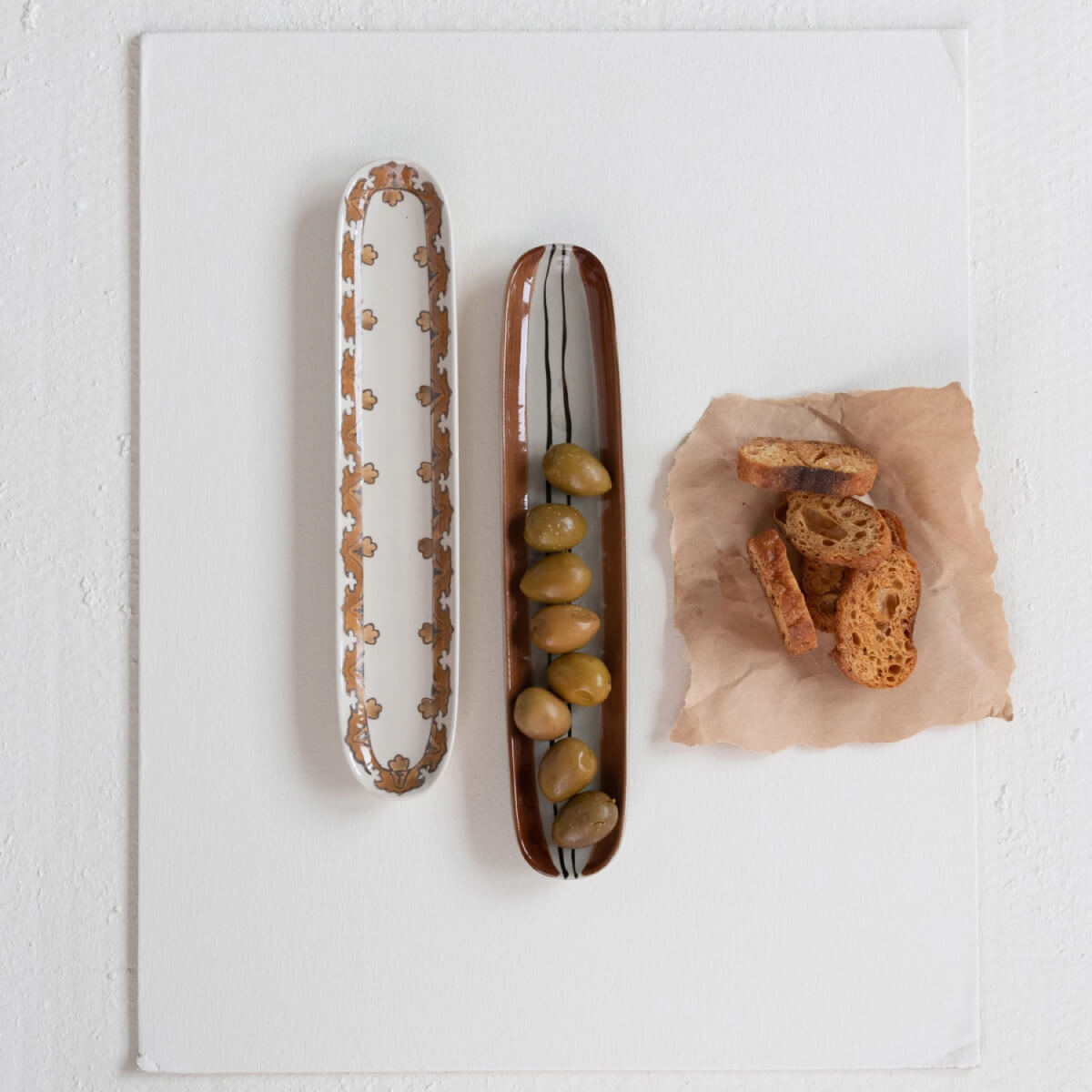 Moroccan Oval Hand-Painted Stoneware Olive Tray top | MILK MONEY milkmoney.co | Home decor online, Modern home decor, Luxury home furnishings, Best home decor, Home accessories for sale, Living room furniture sets, Kitchen decor ideas, Wall art for home, Bathroom accessories, Vintage home decor, Minimalist home decor