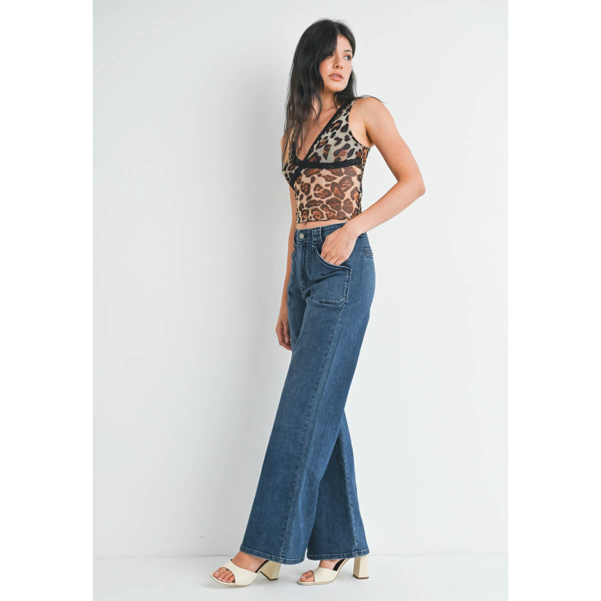 Patch Pocket Flare Leg Jeans dark wash blue side | MILK MONEY milkmoney.co | cute clothes for women. womens online clothing. trendy online clothing stores. womens casual clothing online. trendy clothes online. trendy women's clothing online. ladies online clothing stores. trendy women's clothing stores. cute female clothes.