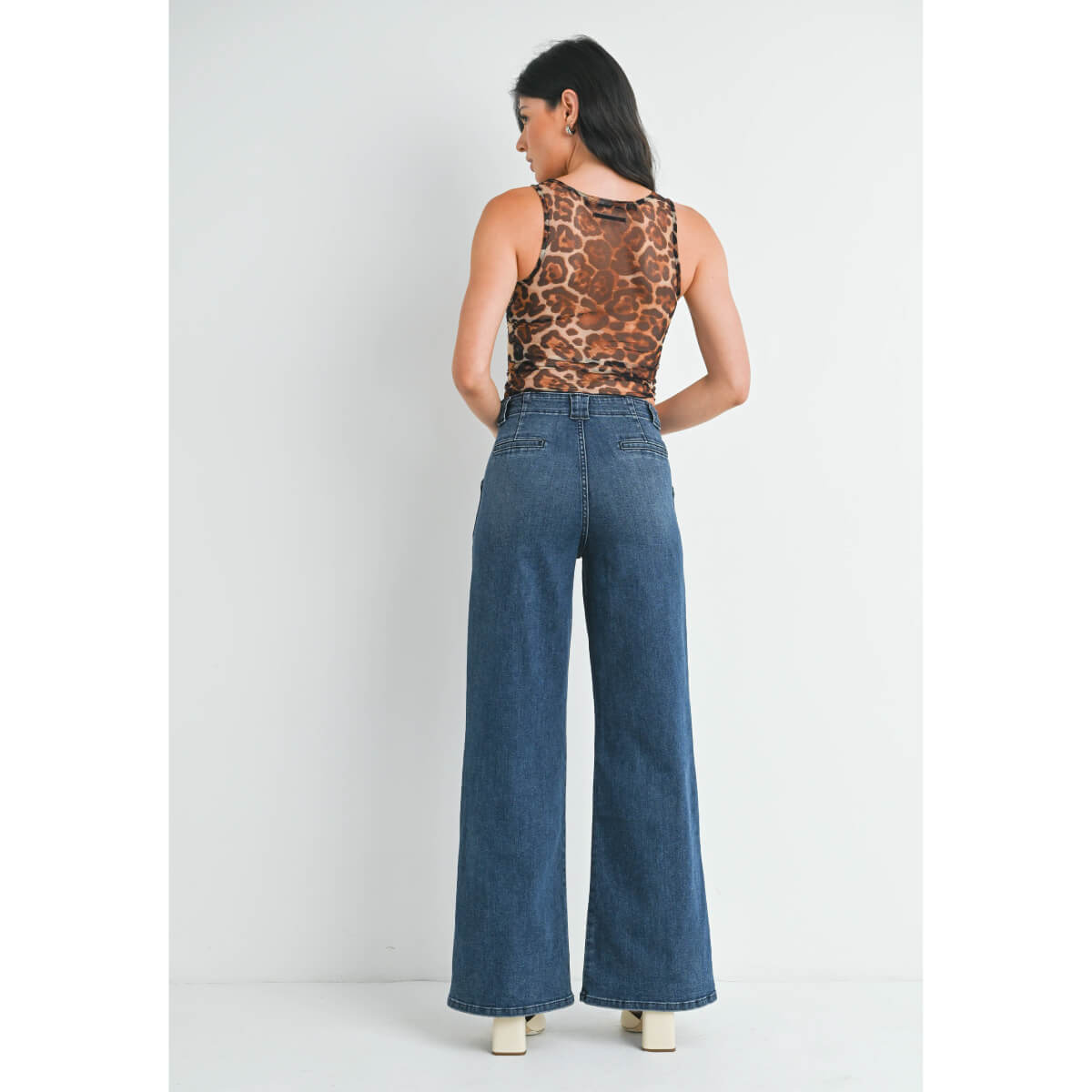 Patch Pocket Flare Leg Jeans dark wash blue back | MILK MONEY milkmoney.co | cute clothes for women. womens online clothing. trendy online clothing stores. womens casual clothing online. trendy clothes online. trendy women's clothing online. ladies online clothing stores. trendy women's clothing stores. cute female clothes.