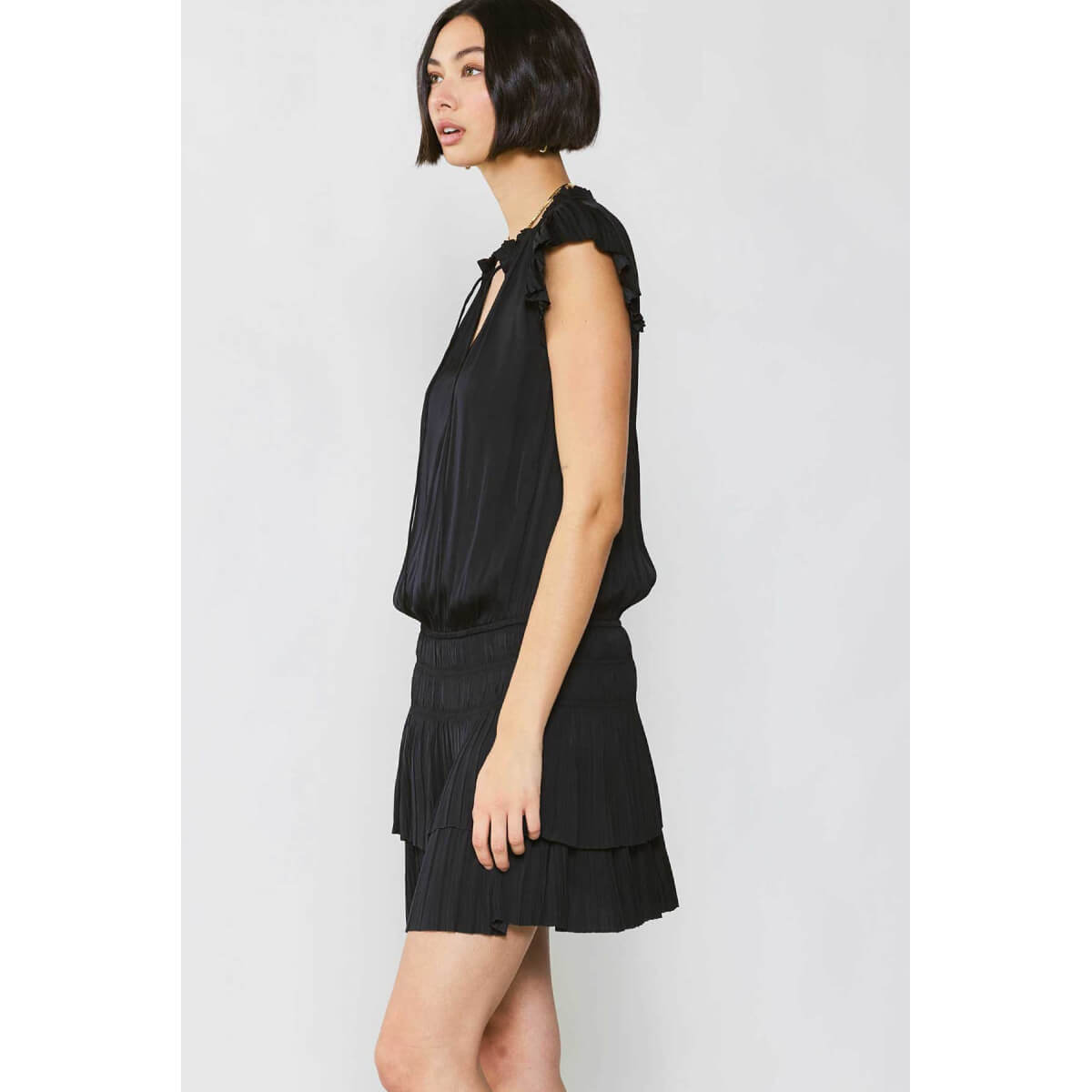 Pleated Skirt Mini Dress black side | MILK MONEY milkmoney.co | cute clothes for women. womens online clothing. trendy online clothing stores. womens casual clothing online. trendy clothes online. trendy women's clothing online. ladies online clothing stores. trendy women's clothing stores. cute female clothes.
