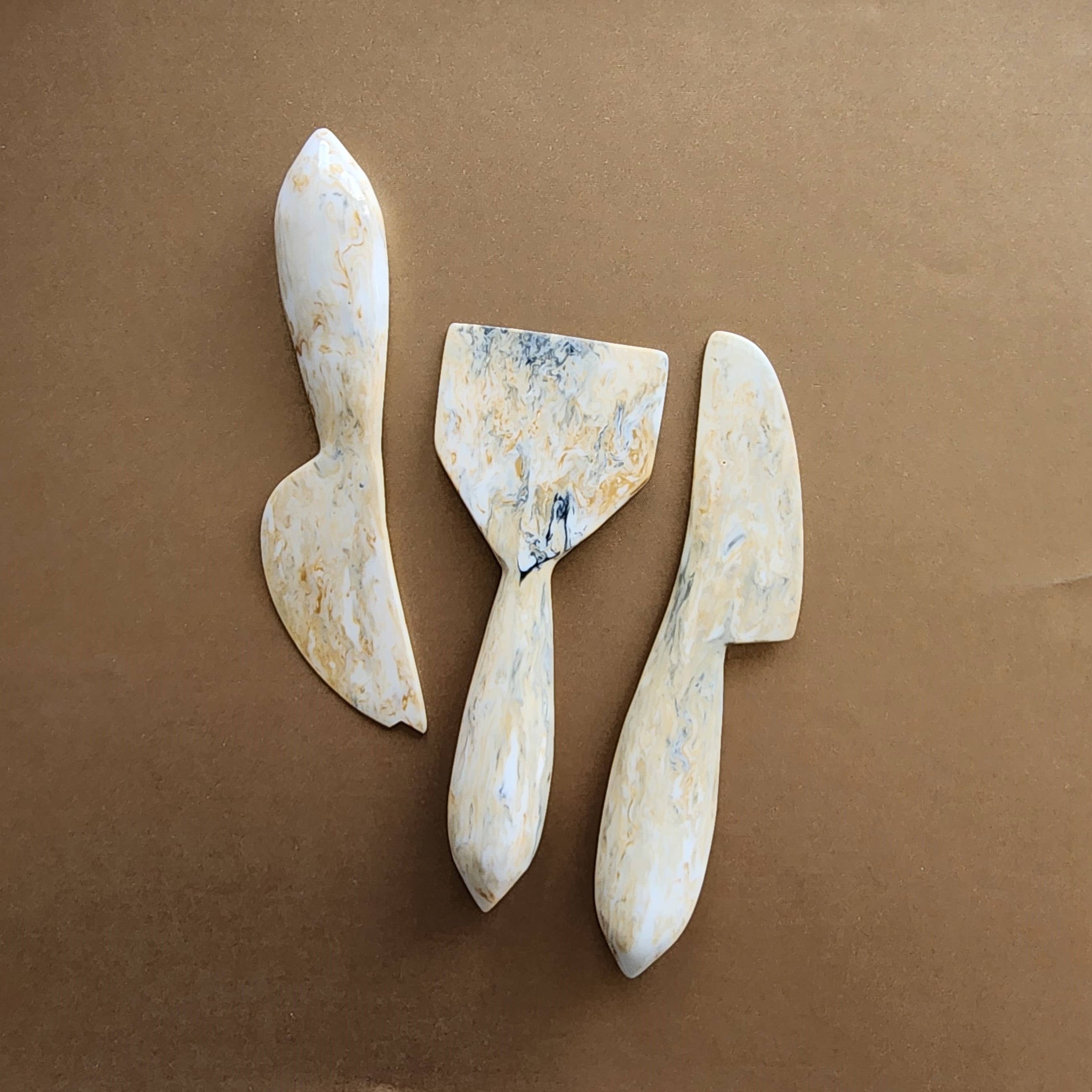 3-Piece Resin Cheese Knives Set white front | MILK MONEY milkmoney.co | white elephant gift ideas, gift, mother's day gift ideas, white elephant gift, gift shops near me