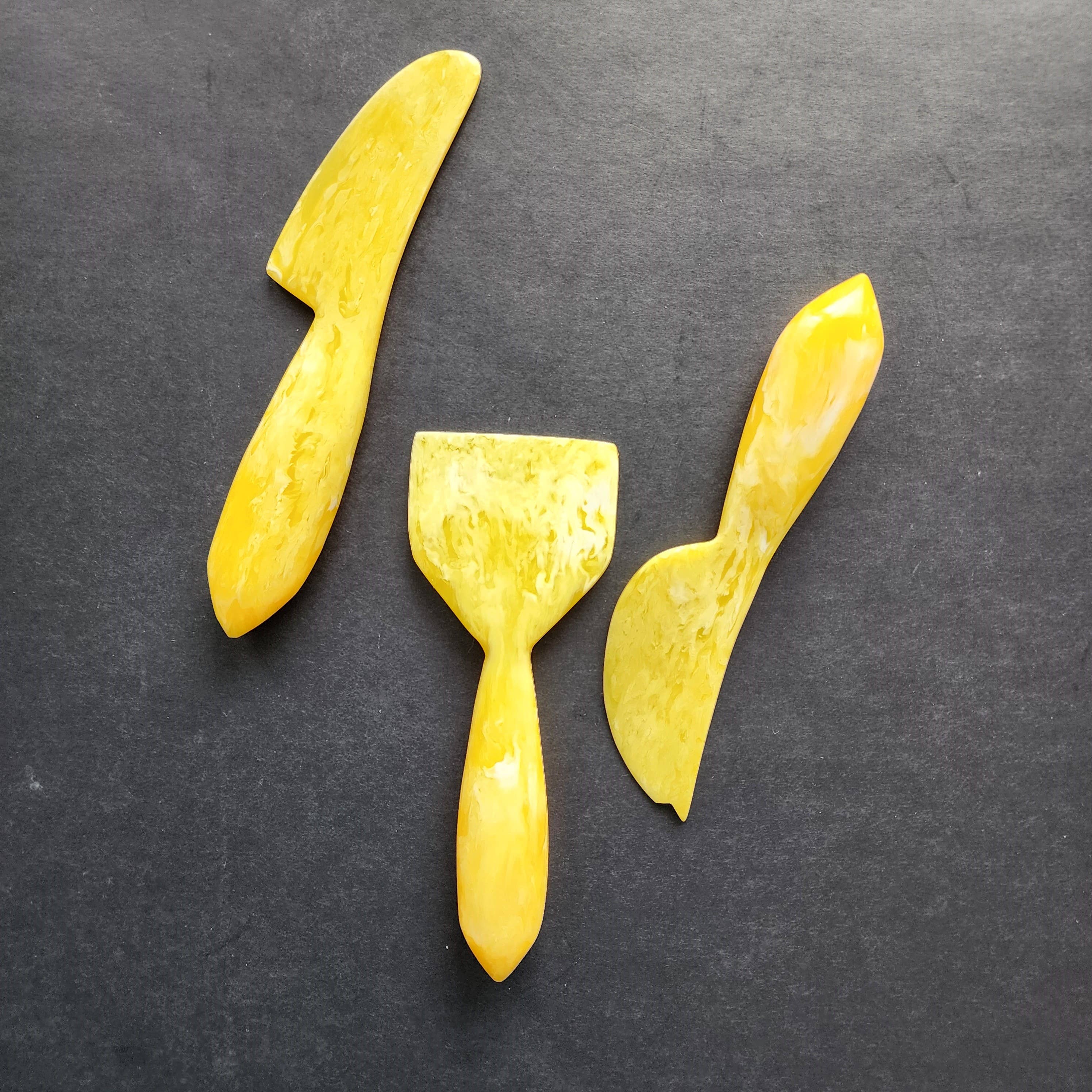 3-Piece Resin Cheese Knives Set yellow front | MILK MONEY milkmoney.co | white elephant gift ideas, gift, mother's day gift ideas, white elephant gift, gift shops near me