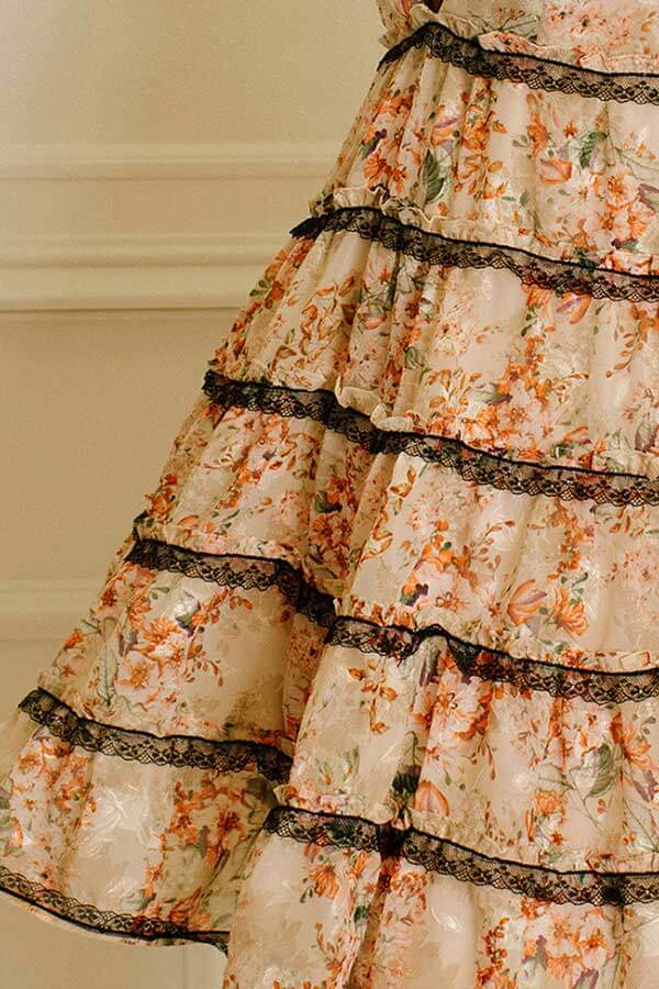 Floral Tiered Mini Dress beige detail | MILK MONEY milkmoney.co | cute clothes for women. womens online clothing. trendy online clothing stores. womens casual clothing online. trendy clothes online. trendy women's clothing online. ladies online clothing stores. trendy women's clothing stores. cute female clothes.