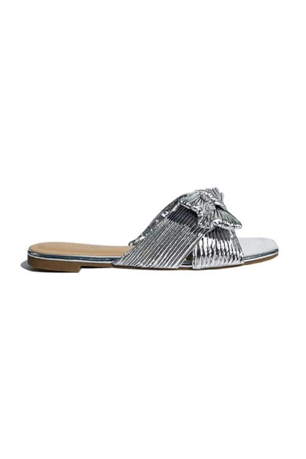 Pleated Metallic Bow Flat Sandal silver top | MILK MONEY milkmoney.co | cute sandals for women. cute slides for women. trendy womens sandals. women sandals online. pretty sandals for women. cute slides womens.