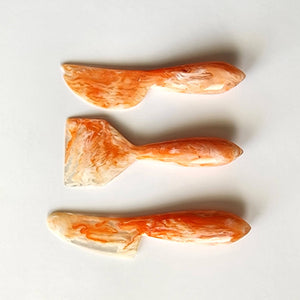 3-Piece Resin Cheese Knives Set orange front | MILK MONEY milkmoney.co | white elephant gift ideas, gift, mother's day gift ideas, white elephant gift, gift shops near me