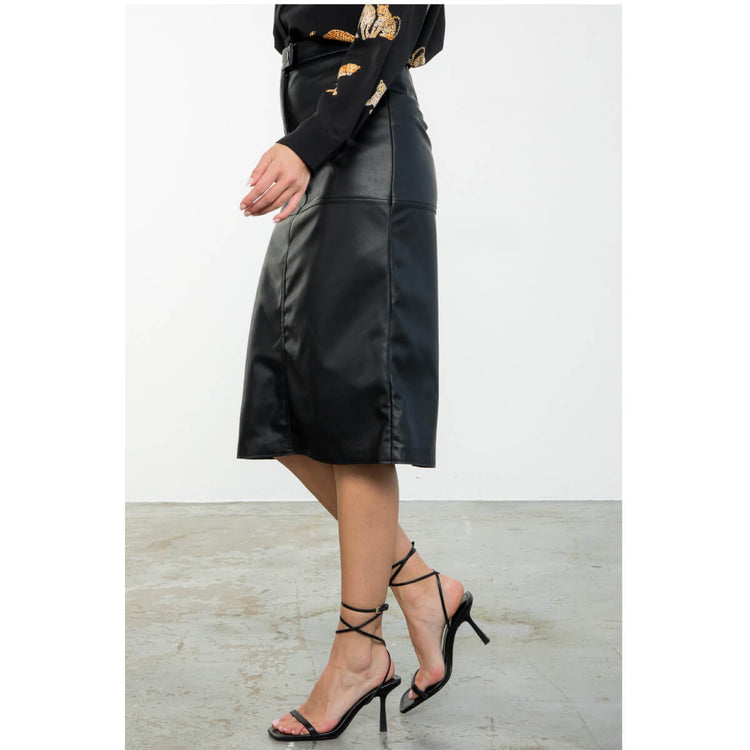 Faux Leather Midi Skirt black side| MILK MONEY milkmoney.co | cute clothes for women. womens online clothing. trendy online clothing stores. womens casual clothing online. trendy clothes online. trendy women's clothing online. ladies online clothing stores. trendy women's clothing stores. cute female clothes.