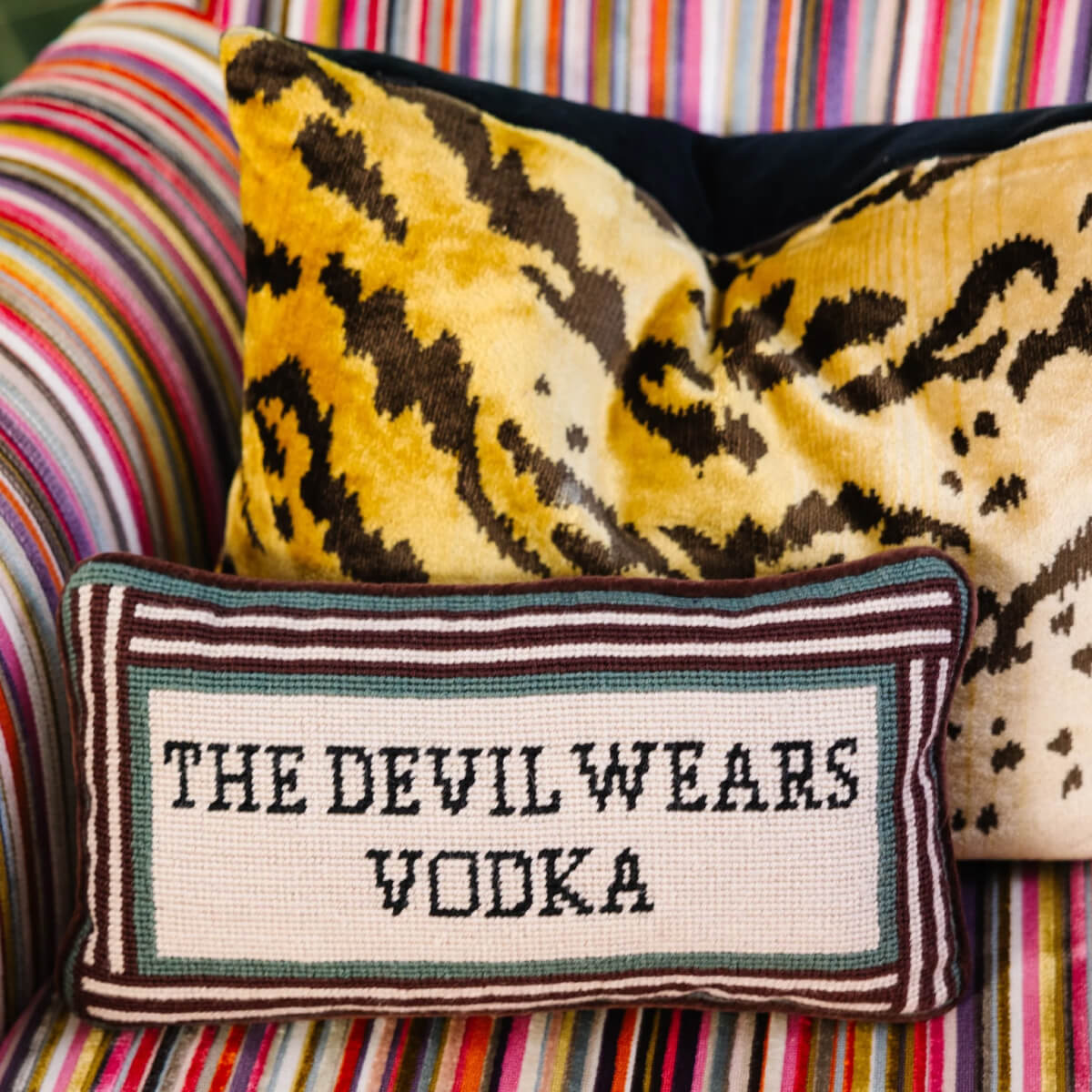 Furbish Studio Devil Wears Vodka Needlepoint Pillow front | MILK MONEY milkmoney.co | 	Home decor online, Modern home decor, Luxury home furnishings, Best home decor, Home accessories for sale, Living room furniture sets, Kitchen decor ideas, Wall art for home, Bathroom accessories, Vintage home decor, Minimalist home decor
