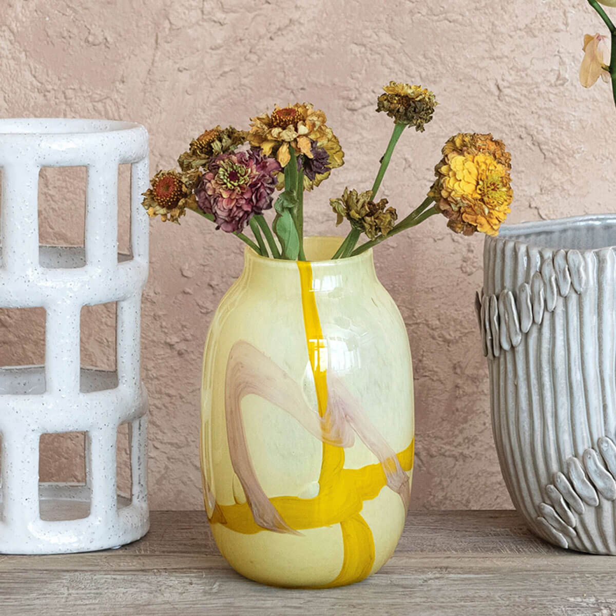 Glass Abstract Design Vase front yellow | MILK MONEY milkmoney.co | 	Home decor online, Modern home decor, Luxury home furnishings, Best home decor, Home accessories for sale, Living room furniture sets, Kitchen decor ideas, Wall art for home, Bathroom accessories, Vintage home decor, Minimalist home decor
