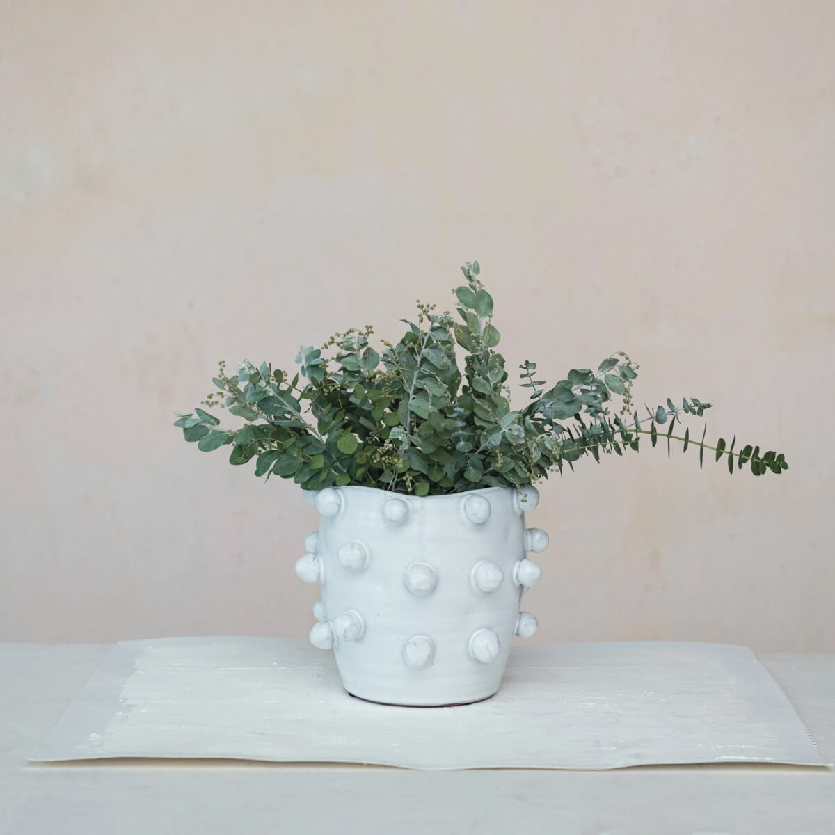 Handmade Hobnail Terra-cotta Planter white front | MILK MONEY milkmoney.co | 	Home decor online, Modern home decor, Luxury home furnishings, Best home decor, Home accessories for sale, Living room furniture sets, Kitchen decor ideas, Wall art for home, Bathroom accessories, Vintage home decor, Minimalist home decor
