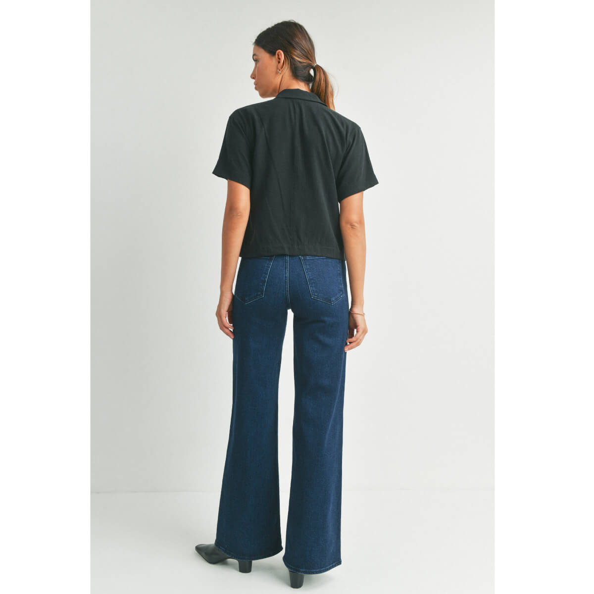 High Rise Dark Wash Palazzo Jeans blue back | MILK MONEY milkmoney.co | cute clothes for women. womens online clothing. trendy online clothing stores. womens casual clothing online. trendy clothes online. trendy women's clothing online. ladies online clothing stores. trendy women's clothing stores. cute female clothes.