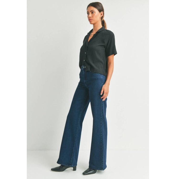 High Rise Dark Wash Palazzo Jeans blue side | MILK MONEY milkmoney.co | cute clothes for women. womens online clothing. trendy online clothing stores. womens casual clothing online. trendy clothes online. trendy women's clothing online. ladies online clothing stores. trendy women's clothing stores. cute female clothes.