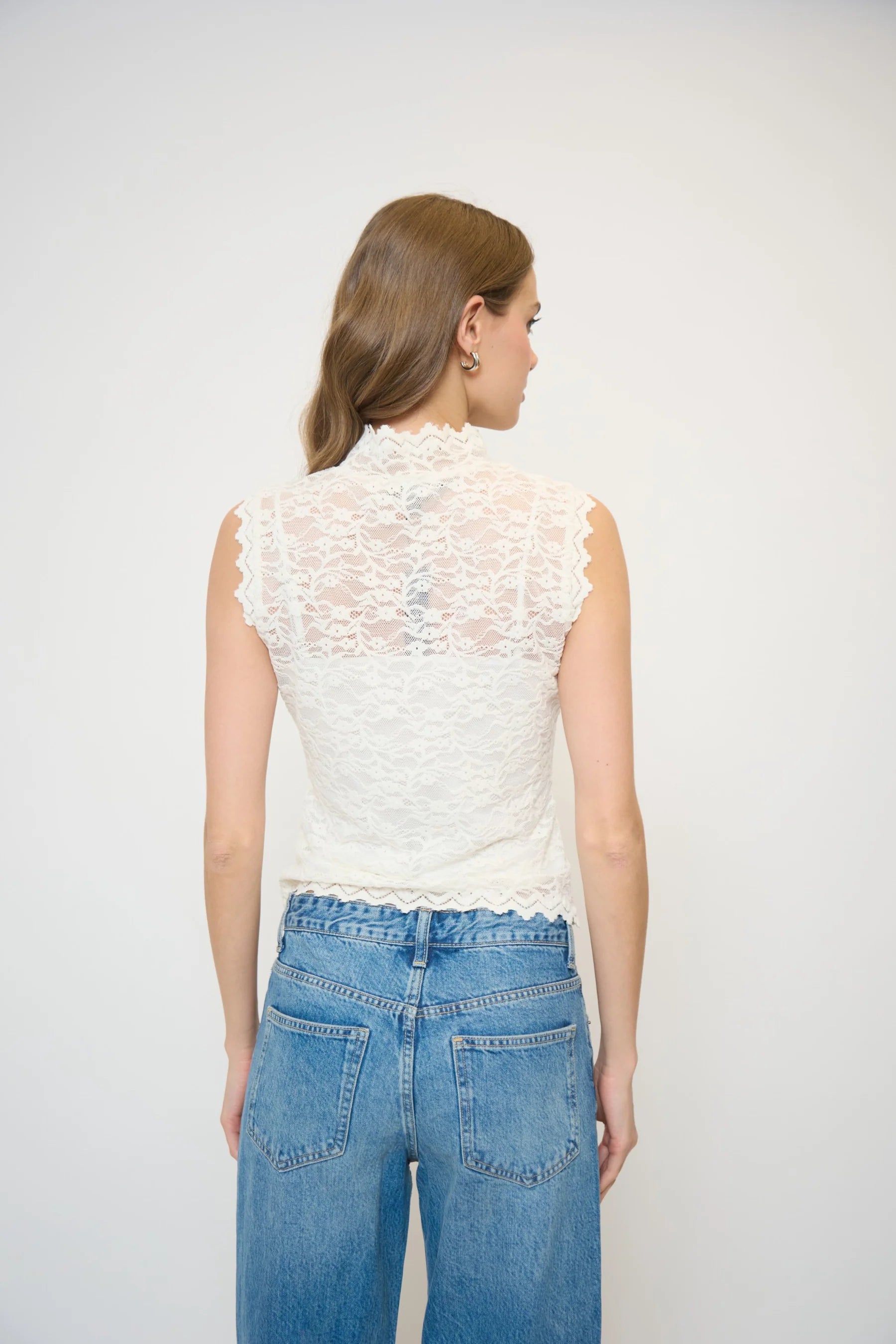 Central Park West Sleeveless Lace Turtleneck