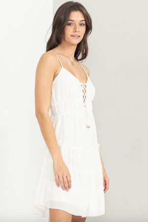 Lace Up Tiered Mini Dress white front | MILK MONEY milkmoney.co | cute clothes for women. womens online clothing. trendy online clothing stores. womens casual clothing online. trendy clothes online. trendy women's clothing online. ladies online clothing stores. trendy women's clothing stores. cute female clothes.