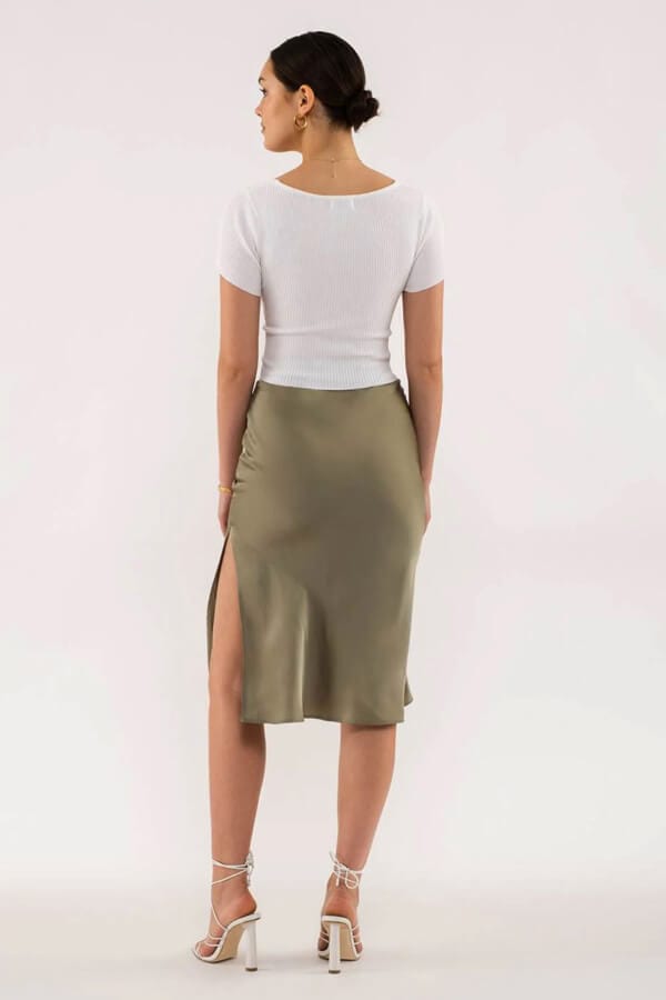 Side Slit Satin Skirt olive back | MILK MONEY milkmoney.co | cute clothes for women. womens online clothing. trendy online clothing stores. womens casual clothing online. trendy clothes online. trendy women's clothing online. ladies online clothing stores. trendy women's clothing stores. cute female clothes.