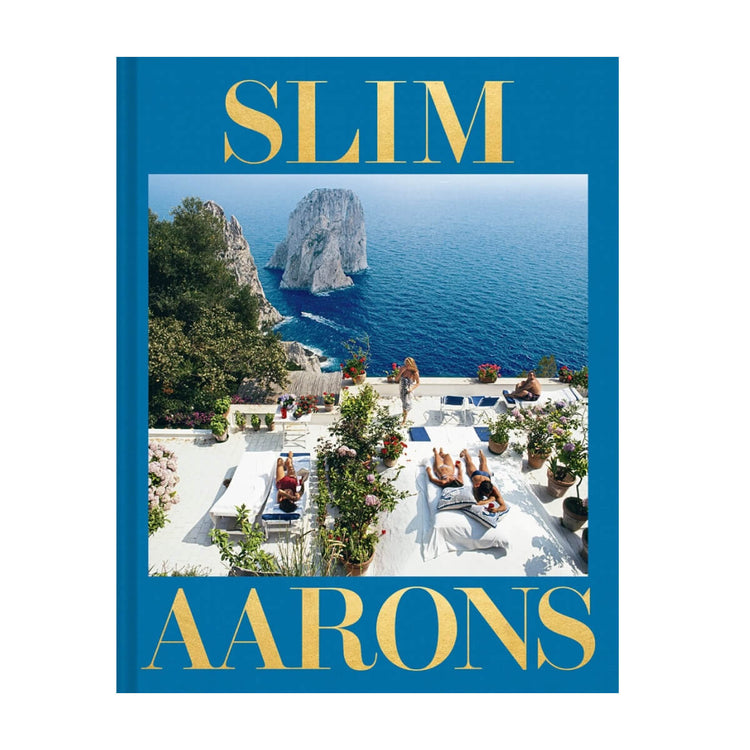 Slim Aarons: The Essential Collection Book front | MILK MONEY milkmoney.co | white elephant gift ideas, gift, mother's day gift ideas, white elephant gift, gift shops near me, cute home decor, mother's day gift, cute home accents, handmade in USA, elegant home decor
