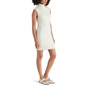 Steve Madden Karissa Turtleneck Sleeveless Sweater Mini Dress cream side | MILK MONEY milkmoney.co | cute clothes for women. womens online clothing. trendy online clothing stores. womens casual clothing online. trendy clothes online. trendy women's clothing online. ladies online clothing stores. trendy women's clothing stores. cute female clothes.
