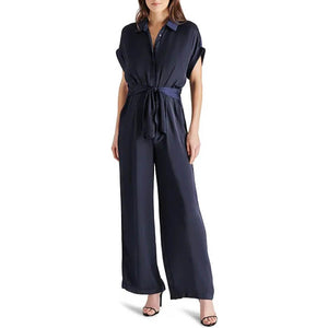 Steve Madden Tori Tie Waist Wide Leg Satin Jumpsuit navy front | MILK MONEY milkmoney.co | cute clothes for women. womens online clothing. trendy online clothing stores. womens casual clothing online. trendy clothes online. trendy women's clothing online. ladies online clothing stores. trendy women's clothing stores. cute female clothes.