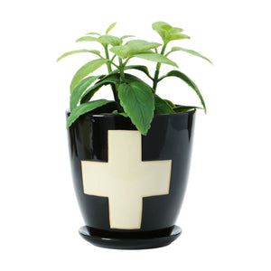 Swiss Cross Planter with Saucer black front | MILK MONEY milkmoney.co | 	Home decor online, Modern home decor, Luxury home furnishings, Best home decor, Home accessories for sale, Living room furniture sets, Kitchen decor ideas, Wall art for home, Bathroom accessories, Vintage home decor, Minimalist home decor
