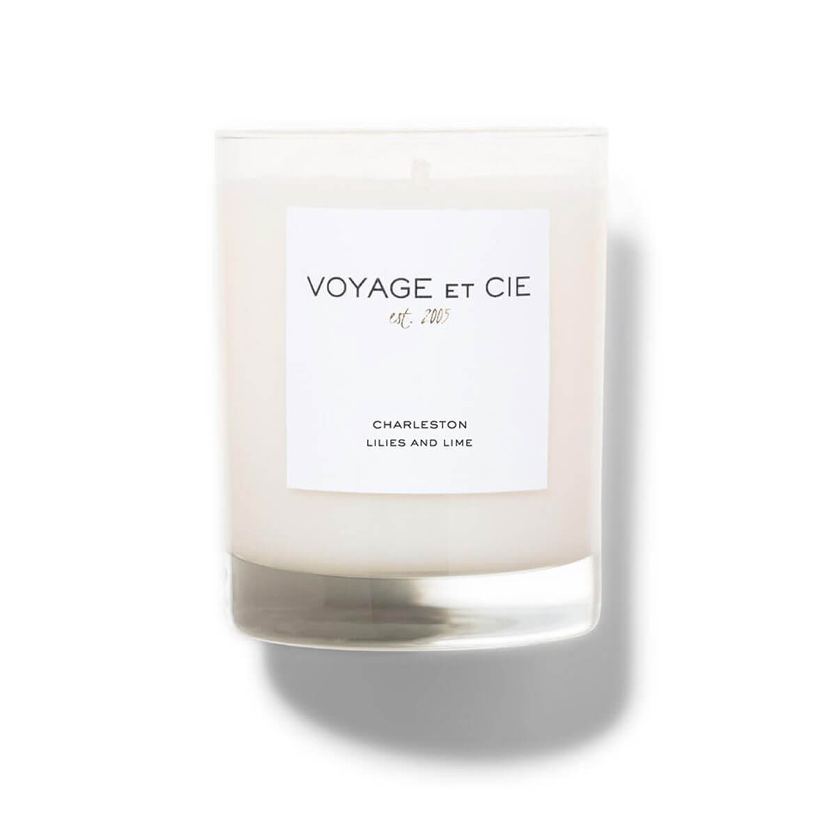 Voyage et Cie Charleston Lillies and Lime Candle front | MILK MONEY milkmoney.co | soy wax candles, small candles. natural candles, organic candles, scented soy candles, concrete candle, hand poured candles, hand poured soy candles, cement candle, hand poured soy wax candles, scented hand poured candles, hand poured scented candles