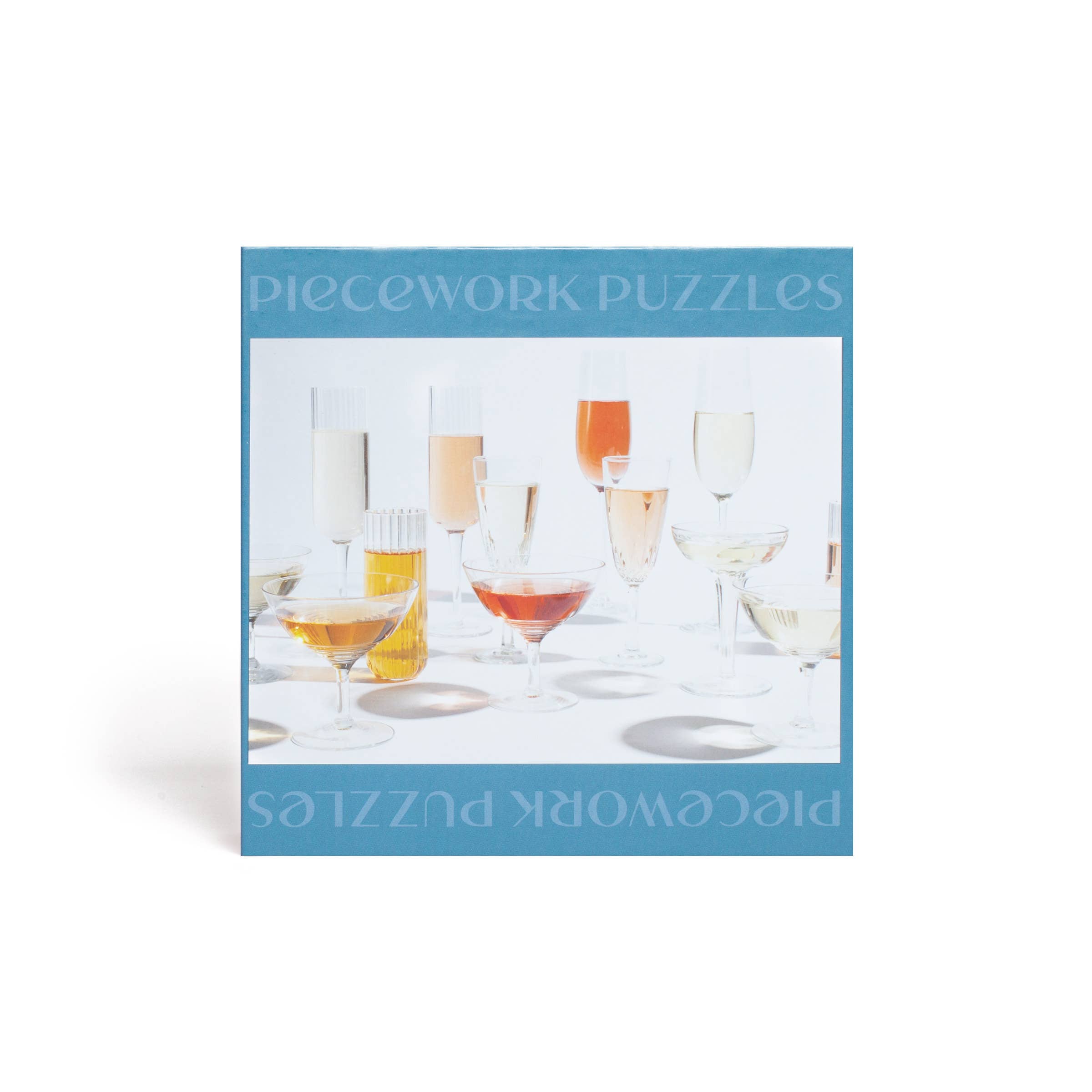 Piecework Puzzle Champagne Problems Jigsaw Puzzle back
