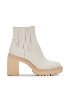 Dolce Vita Caster H2O Waterproof Block Heel Bootie ivory leather side | MILK MONEY milkmoney.co | cute shoes for women. ladies shoes. nice shoes for women. ladies shoes online. ladies footwear. womens shoes and boots. pretty shoes for women. beautiful shoes for women.