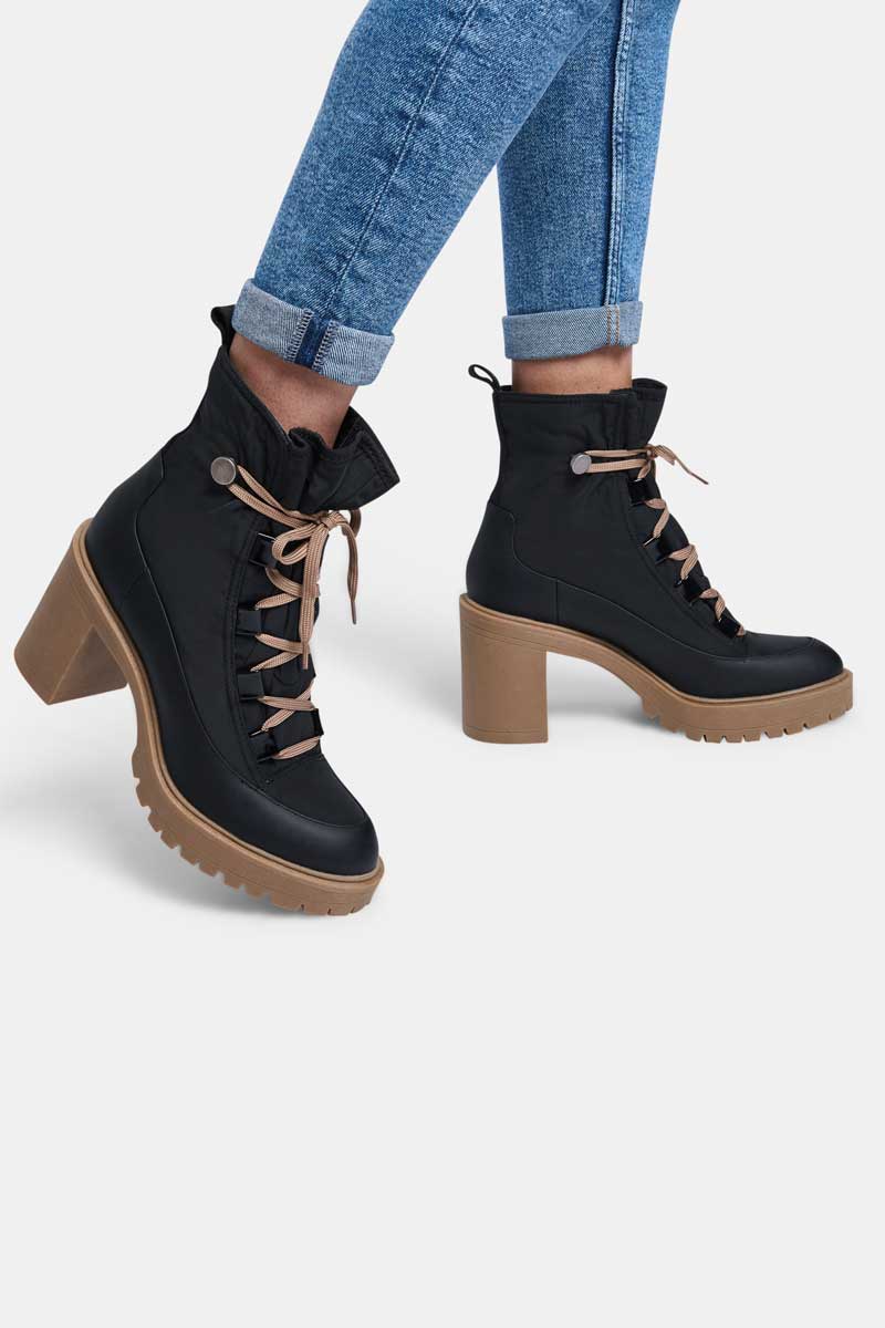Dolce Vita Celida Boots black nylon side model | MILK MONEY milkmoney.co | cute shoes for women. ladies shoes. nice shoes for women. ladies shoes online. ladies footwear. womens shoes and boots. pretty shoes for women. beautiful shoes for women.