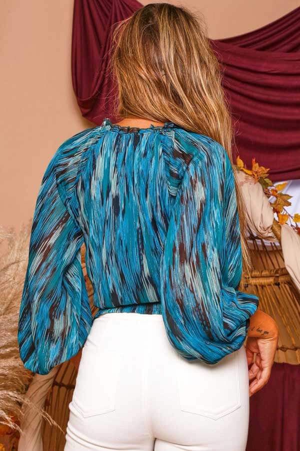 Feathered V Neck Wrap Blouse blue back | MILK MONEY milkmoney.co | cute clothes for women. womens online clothing. trendy online clothing stores. womens casual clothing online. trendy clothes online. trendy women's clothing online. ladies online clothing stores. trendy women's clothing stores. cute female clothes.