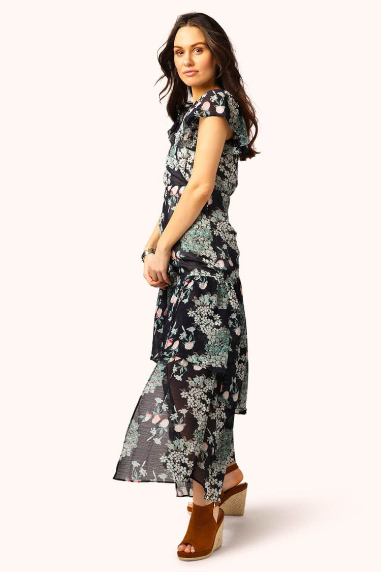 Ruffle Floral Maxi Dress navy side | MILK MONEY milkmoney.co | cute clothes for women. womens online clothing. trendy online clothing stores. womens casual clothing online. trendy clothes online. trendy women's clothing online. ladies online clothing stores. trendy women's clothing stores. cute female clothes.