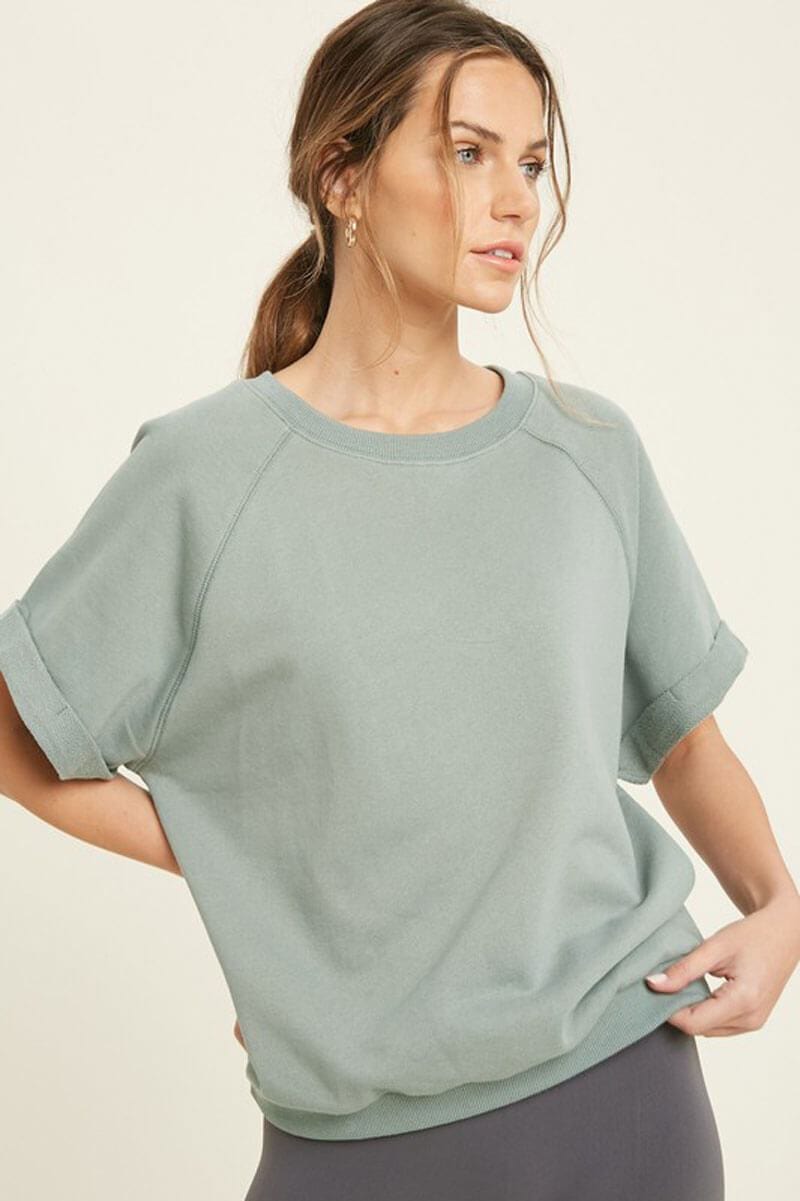 French Terry Raglan Top sage front | MILK MONEY milkmoney.co | A super loose fit trendy tops for women top featuring a fold cuff at sleeves and neck line, banded bottom.