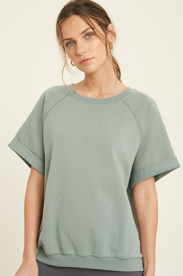 French Terry Raglan Top sage front | MILK MONEY milkmoney.co | A super loose fit trendy tops for women top featuring a fold cuff at sleeves and neck line, banded bottom.