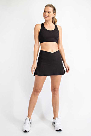 High Waisted Tennis Mini Skirt black front | MILK MONEY milkmoney.co | activewear sets. cute workout clothes. cute workout sets. cute activewear. cute womens workout clothes cute gym clothes.