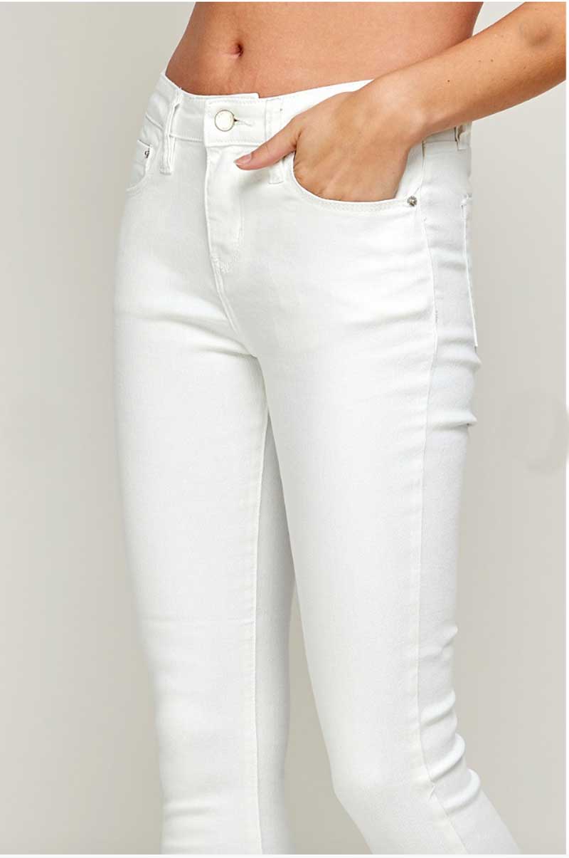 Mid Rise White Raw Hem Classic Skinny Jeans detail | MILK MONEY milkmoney.co | cute clothes for women. womens online clothing. trendy online clothing stores. womens casual clothing online. trendy clothes online. trendy women's clothing online. ladies online clothing stores. trendy women's clothing stores. cute female clothes.