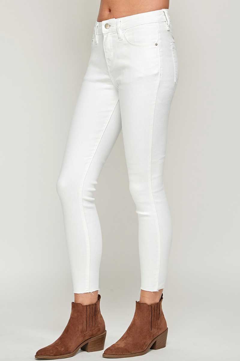 Mid Rise White Raw Hem Classic Skinny Jeans side | MILK MONEY milkmoney.co | cute clothes for women. womens online clothing. trendy online clothing stores. womens casual clothing online. trendy clothes online. trendy women's clothing online. ladies online clothing stores. trendy women's clothing stores. cute female clothes.