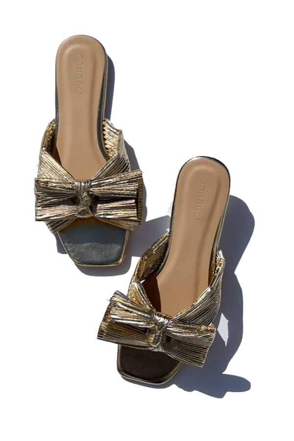 Pleated Metallic Bow Flat Sandal gold top | MILK MONEY milkmoney.co | cute sandals for women. cute slides for women. trendy womens sandals. women sandals online. pretty sandals for women. cute slides womens.