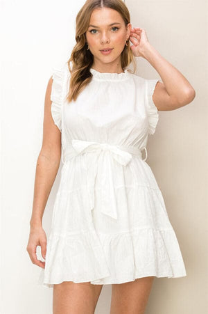 Ruffled Mini Tiered Dress white front | MILK MONEY milkmoney.co | cute clothes for women. womens online clothing. trendy online clothing stores. womens casual clothing online. trendy clothes online. trendy women's clothing online. ladies online clothing stores. trendy women's clothing stores. cute female clothes.