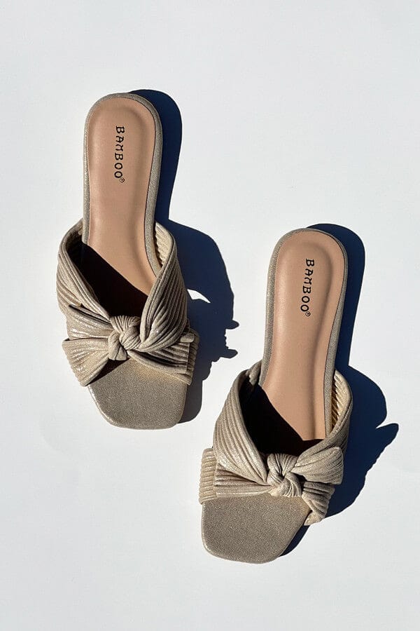 Shimmer Pleated Bow Flat Sandals gold | MILK MONEY milkmoney.co | cute sandals for women. cute slides for women. trendy womens sandals. women sandals online. pretty sandals for women. cute slides womens.