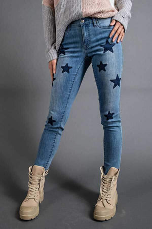 Star Print Slim Mid-Rise Jeans blue front | MILK MONEY milkmoney.co | cute clothes for women. womens online clothing. trendy online clothing stores. womens casual clothing online. trendy clothes online. trendy women's clothing online. ladies online clothing stores. trendy women's clothing stores. cute female clothes.