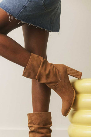 Teagan Camel Modern Slouch Boot side model | MILK MONEY milkmoney.co | cute shoes for women. ladies shoes. nice shoes for women. ladies shoes online. ladies footwear. womens shoes and boots. pretty shoes for women. beautiful shoes for women.  